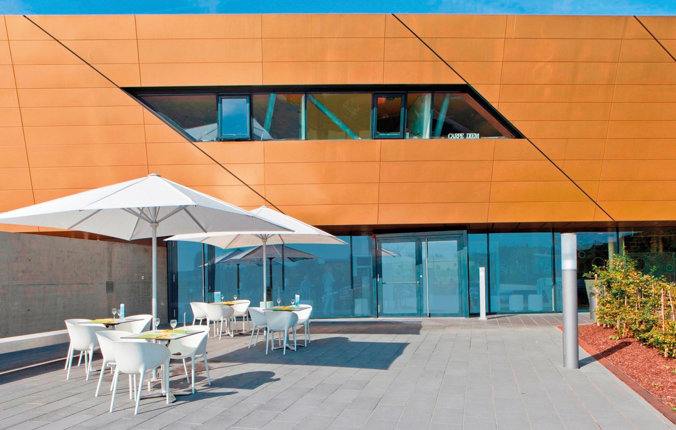 Patio with white parasols